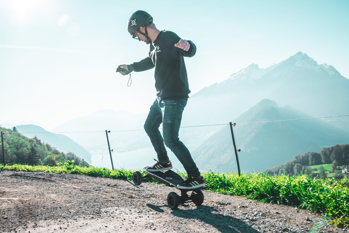 Rider on the ONSRA Challenger Pro All-Terrain on a mountain gravel road