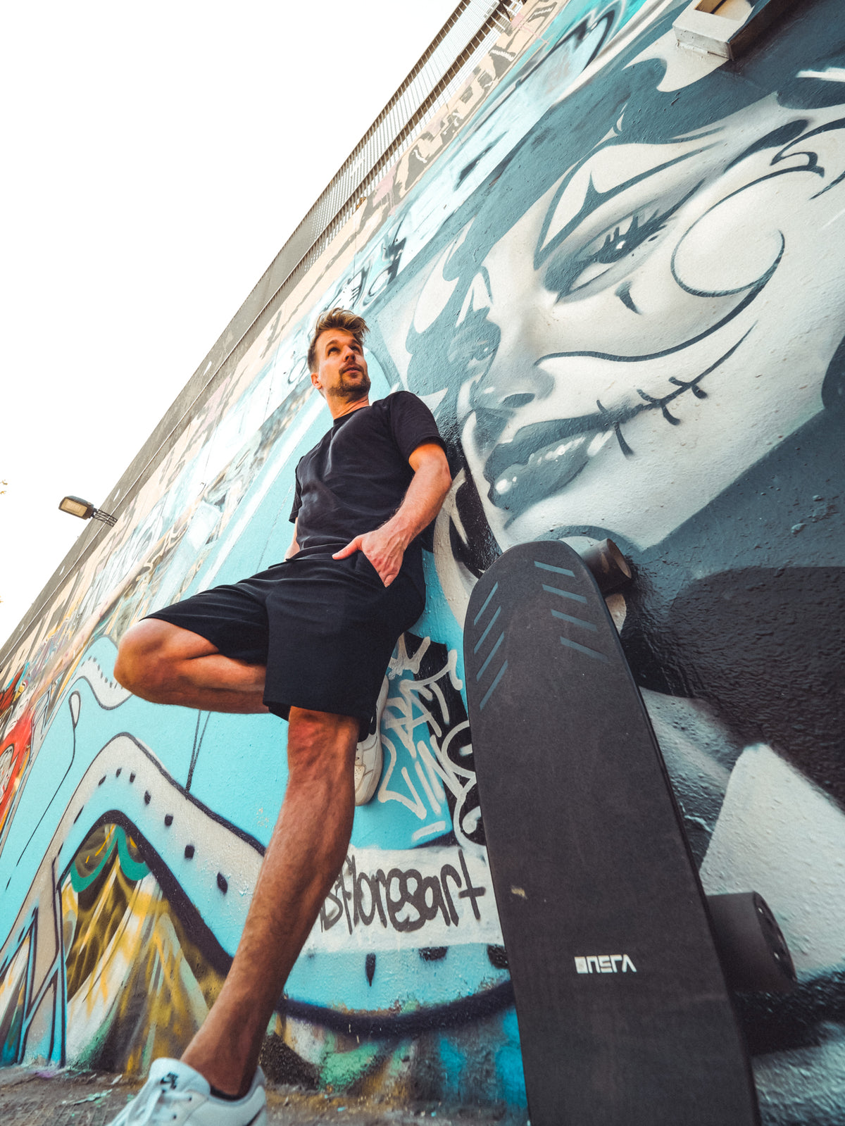 Rider with the ONSRA ZENO at a graffiti wall