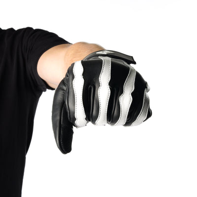 ONSRA BONES KEVLAR motorcycle gloves with white skeleton design and Kevlar reinforcement worn by a rider in a black shirt.