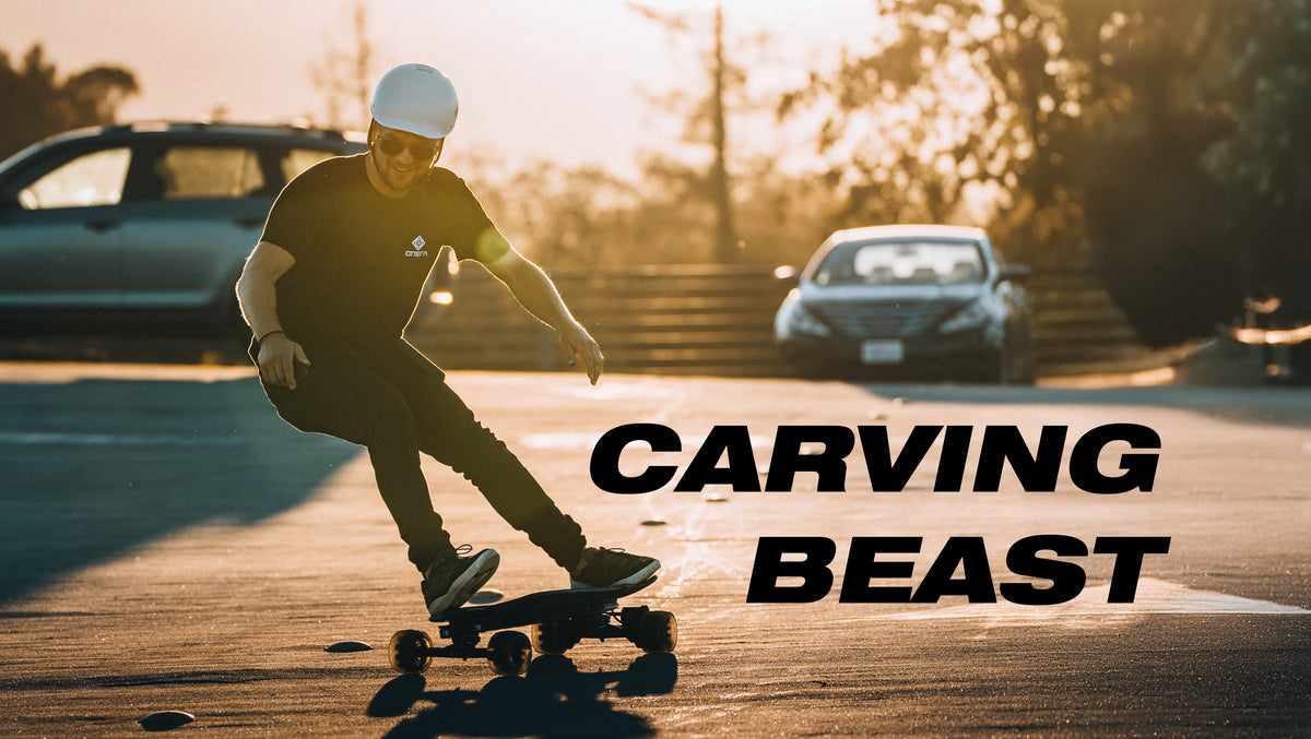 Rider carving on the ONSRA Challenger Pro Street electric skateboard at sunset – "Carving beast"