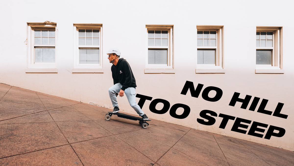 Rider climbing a steep street on the ONSRA Challenger Pro Street – "No hill too steep"